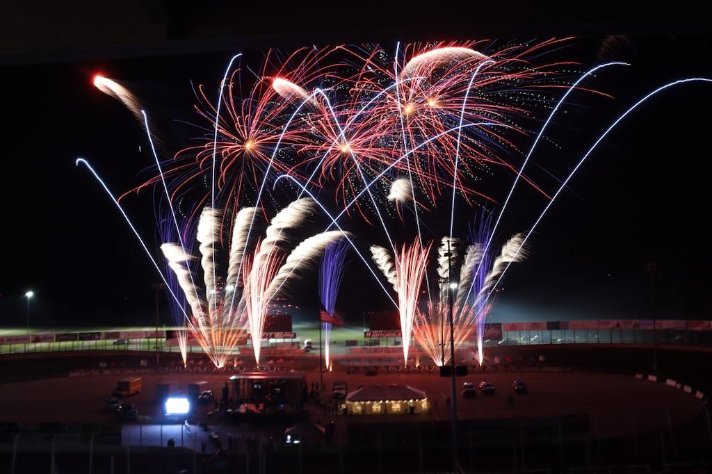 Fireworks illuminating a public celebration